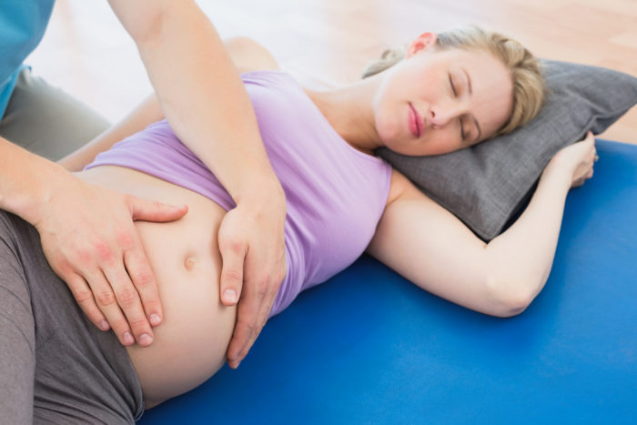 massaggio alla schiena durante la gravidanza